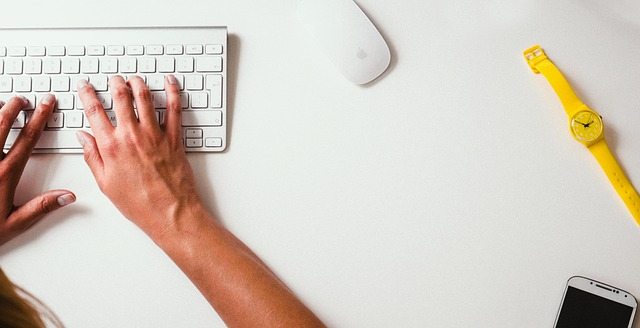 person writing a blog